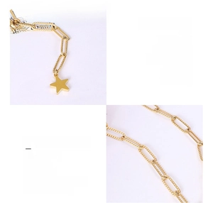Detail of 18K gold-plated titanium steel necklace with star pendant and paperclip chain