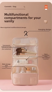 Detail view of pink hanging toiletry bag with waterproof layers and hook organizer