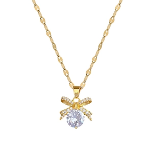 Elegant gold bow pendant necklace for women with zircon inlay on a titanium steel chain