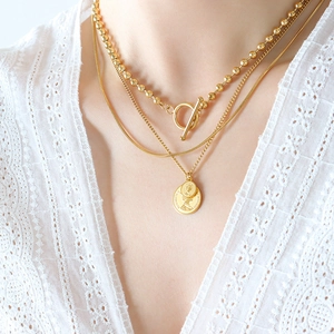Three-layer gold necklace set with toggle clasp, snake chain and coin pendants for women