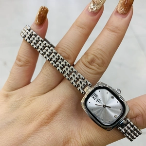 Elegant silver women's quartz watch with small square dial and metal chain strap