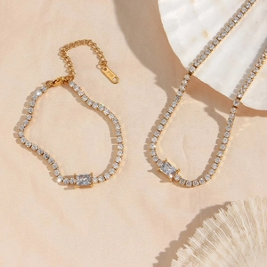 Detail of 18k gold plated tennis chain set with sparkling square zircon stones