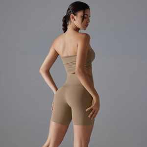 Detail view of khaki seamless yoga set with ruched tube top and high waist leggings