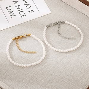 Elegant 4/5/6mm pearl bracelet set with adjustable gold and silver clasps on tray