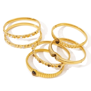 Minimalist gold stainless steel bracelets set with natural stone in a variety of styles