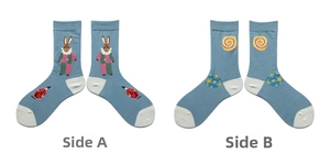 Detail view of cotton ankle socks with forest rabbit jacquard and spiral patterns