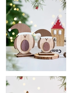 Close-up of wooden Christmas penguin ornaments with natural wood grain and festive decor