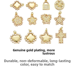Macro view of gold plated pendants with micro-set pearls and sparkling zircon stones