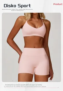 Close-up of pink high-stretch yoga set featuring racerback sports bra and high-waisted shorts