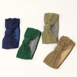 Detail of cable knit headbands with fleece lining in navy, green, and coffee colors