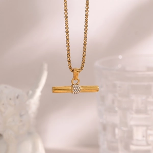 Detailed view of an 18K gold plated stainless steel necklace with a micro-pave T-Bar pendant
