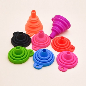 Set of seven colorful collapsible silicone funnels for kitchen use in a variety of vibrant tones