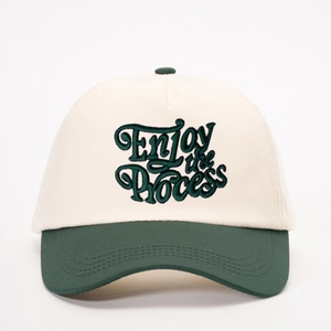 Minimalist cotton baseball cap with Enjoy the Process embroidery in off-white and green