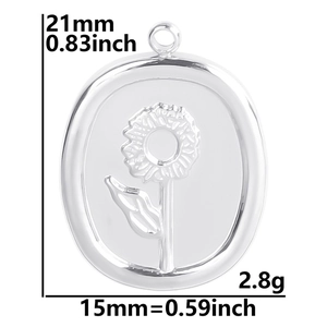 Detail view of oval sunflower pendant showing size dimensions 21mm by 15mm and weight