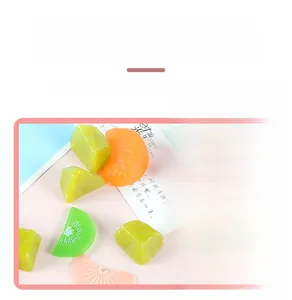 Realistic PVC kiwi and orange slices with detailed texture for cake decoration