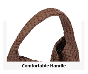 Detail of hand-woven brown tote bag with thick comfortable handle and satin texture