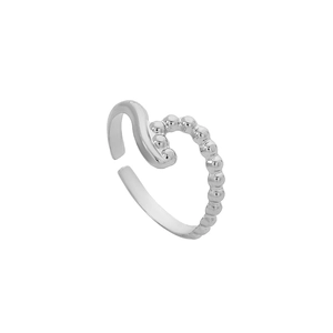 Detailed view of silver titanium steel ring with wavy polished and beaded textures