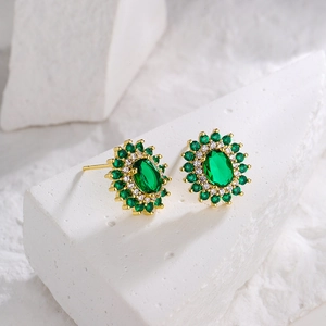 Luxurious 18K gold-plated halo stud earrings with oval emerald green zircon stones