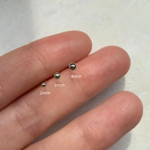 Detailed comparison of 2mm, 3mm, and 4mm polished sterling silver ball stud earrings