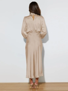 Detailed back view of champagne satin halter dress with keyhole neck and buttons