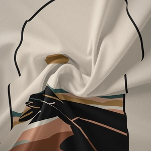 Detailed close-up of bohemian wall tapestry fabric showing soft abstract geometric patterns