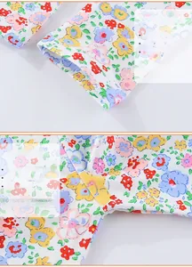 Detail of baby floral leggings showing neat stitching and rolled cuff design