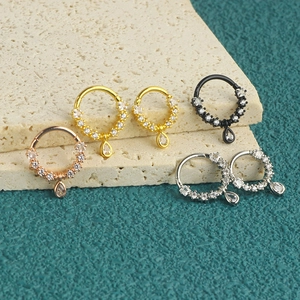 Polished nose rings with zircon charms in gold, rose gold, black, and silver finishes