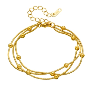 Three-layer gold stainless steel anklet featuring snake chains and polished metal beads