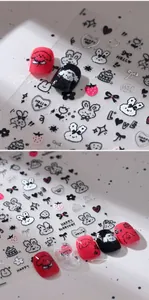 Detail of adhesive nail stickers with silver cartoon rabbit and heart patterns