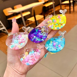 Creative whale oil liquid drift bottle keychains in five colors with glowing snow glitters