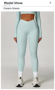 Vue de face du legging de yoga vert crème avec taille haute croisée en V pour sport
