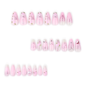 Pink and white gradient press-on nails with star rhinestones and pearl flower accents
