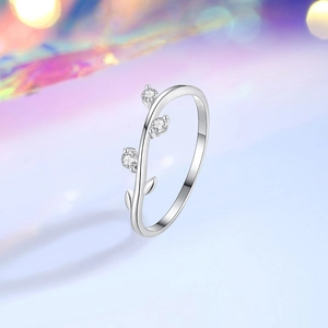 Elegant S925 sterling silver leaf ring with sparkling zircons on a gradient background