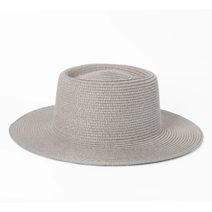 Detailed texture of the woven high-top boater hat in grey straw for sun protection