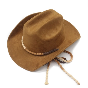 Classic caramel suede western cowboy hat with ethnic beaded band and tassel accents