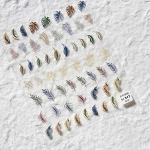 Self-adhesive nail art stickers with vintage green leaf designs on a white background