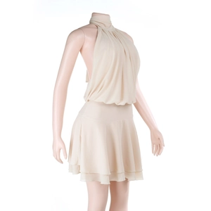 Detail view of beige halter neck chiffon dress showing layered pleated ruffled hemline