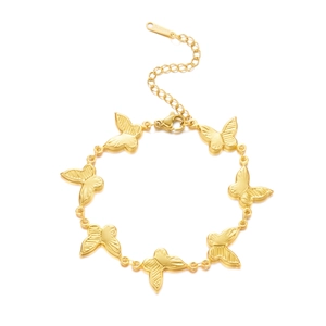 Golden stainless steel butterfly charm bracelet with lobster clasp on white background