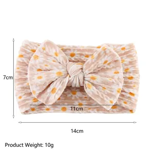 Floral print baby headband with soft oversized double layer bow on white background