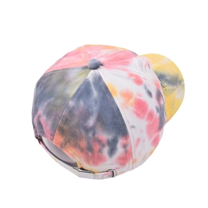 Distressed tie-dye baseball cap with colorful vintage patterns and adjustable buckle