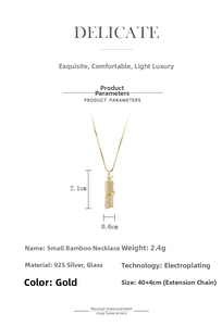 Detailed view of S925 sterling silver gold bamboo pendant necklace with cat-eye stone