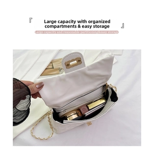 Internal view of quilted chain bag showing spacious compartments with lipstick and cosmetics