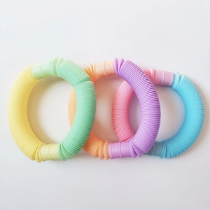 Detailed view of three colorful gradient pop tubes for children sensory stress relief