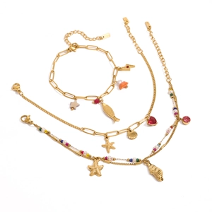 Golden stainless steel jewelry set with starfish, shell, and colorful ocean charms