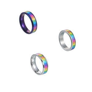 Rainbow rainbow stainless steel fidget rings for anxiety on clean white background