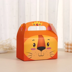 Détail de la boîte à bonbons lion avec couronne et poignée pour fête d'enfant