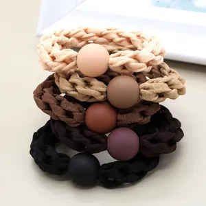 Five-piece set of woven milk tea colored elastic hair ties with matching matte round beads