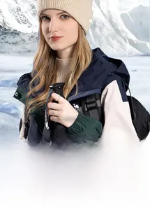 Winter knitted beanie hats in beige and grey shown against a snowy mountain background