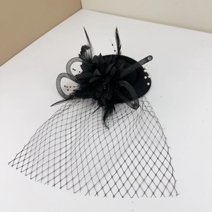 Vintage black fascinator hat with mesh veil, feathers and pearls for party