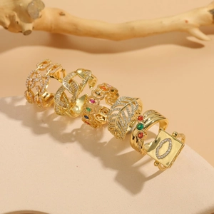 Set of six 14K gold-plated rings with zircon geometric patterns and leaf designs